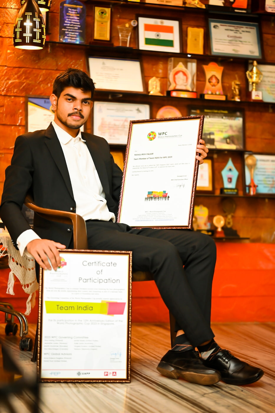 Posing with photography achievements
